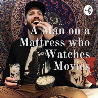 A Man on a Mattress who Watches Movies